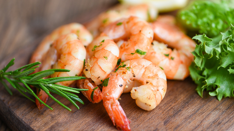 Platter of shrimp and greens