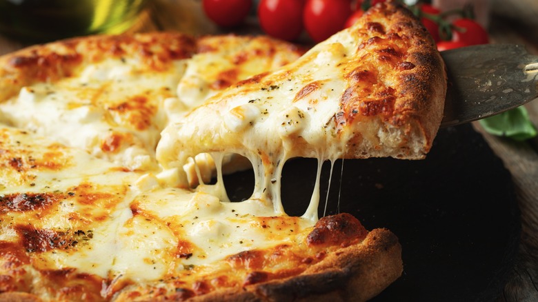 four cheese pizza with basil