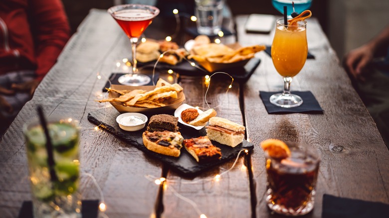 table of finger foods and drinks