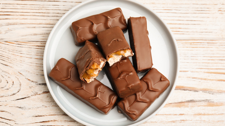 Plate of peanut and caramel filled chocolate bars