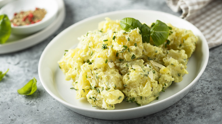 Potato salad on white dish