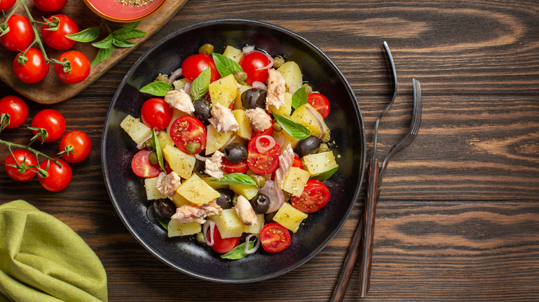 Tomatoes, potatoes, tuna, in bowl