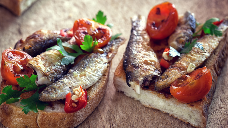 sardines on toast with tomatoes and herbs