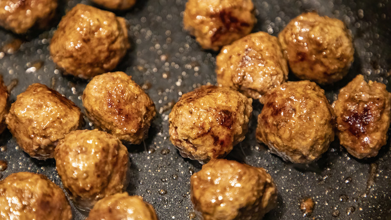 Tandoori meatballs on a black plate