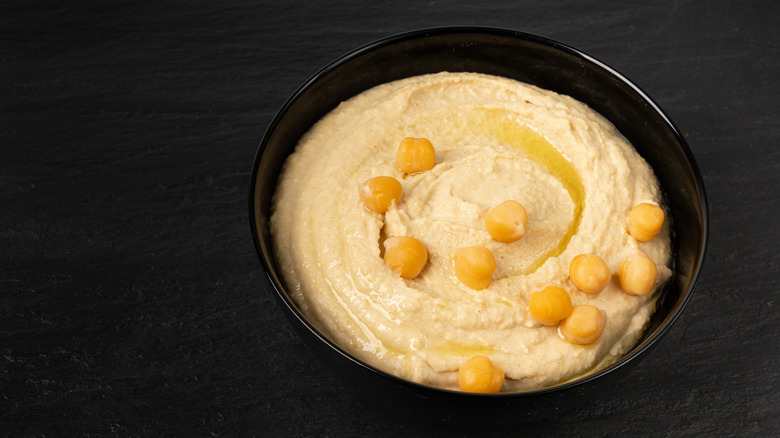 Bowl of hummus topped with chickpeas