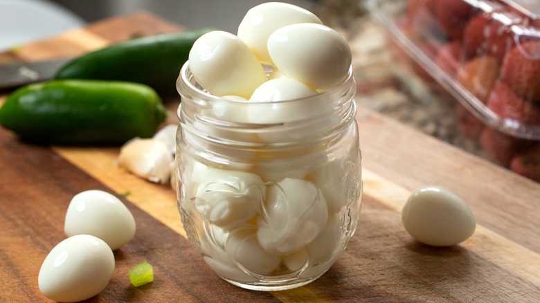 Hard-boiled eggs stacked into a mason jar