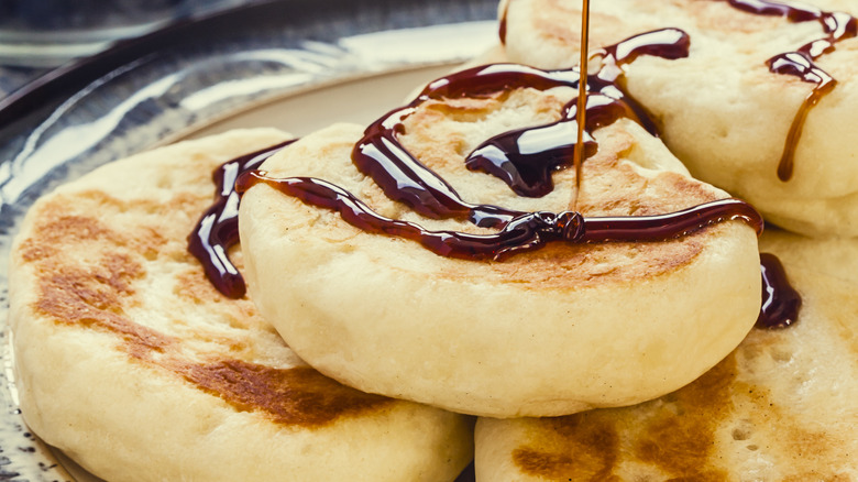 Molasses over stack of toutons 