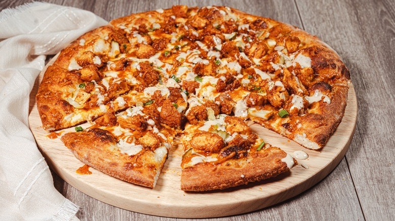 A mouthwatering Nashville Hot pizza from Old Chicago Pizza + Taproom