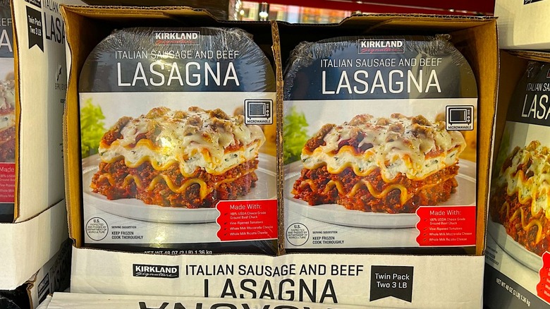 Packages of Kirkland Signature Italian Sausage and Beef Lasagna on display at Costco