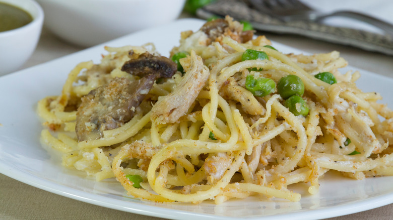 shredded chicken pasta with mushrooms and peas
