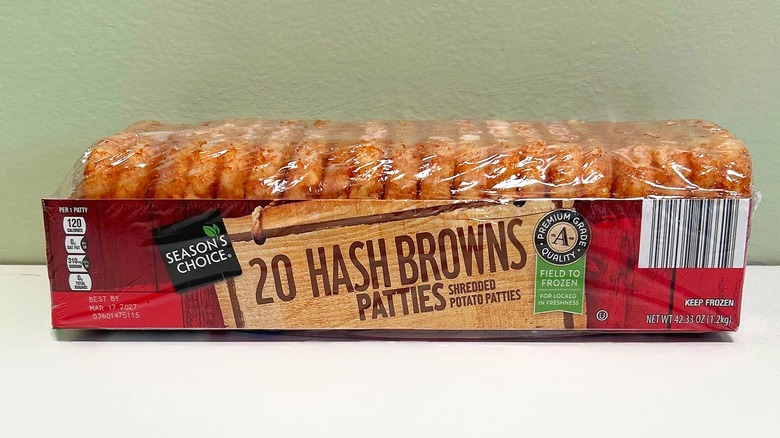 A pack of Season's Choice Hash Browns on a green and white background