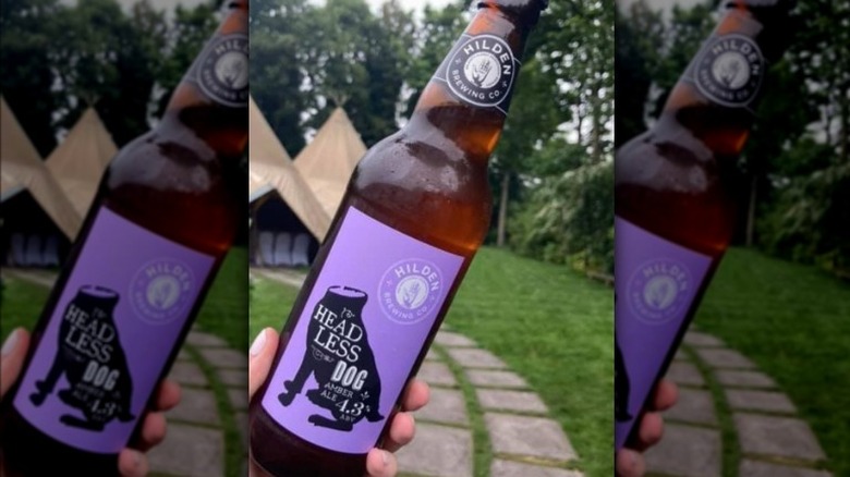 The Headless Dog bottle outside