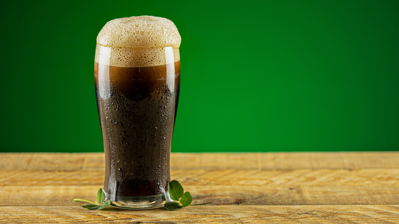 frothy beer and clover