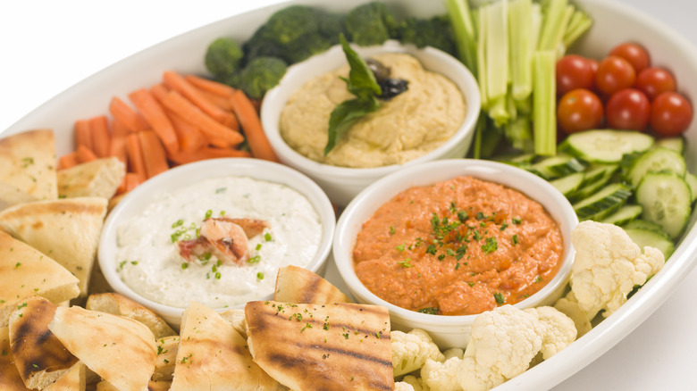 Dips with veggies and pita