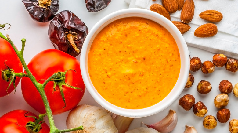 Romesco sauce in white bowl