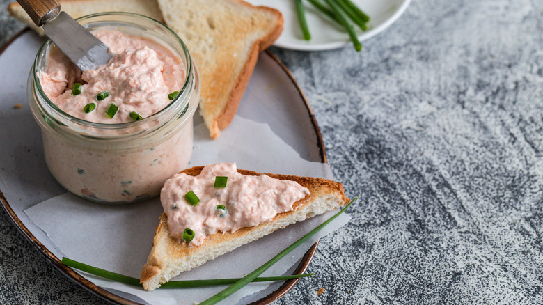 Salmon dip in jar and on bread
