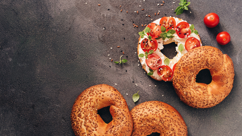 Bagel with sliced cherry tomatoes