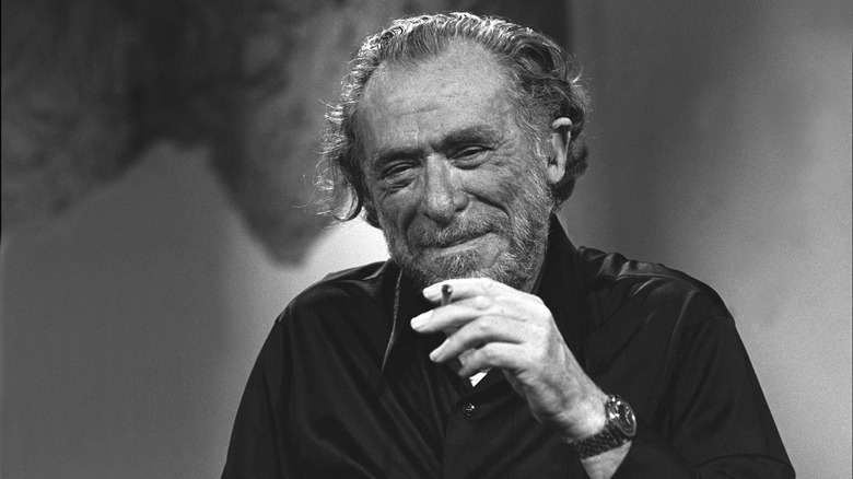 Photo of Charles Bukowski with a cigarette