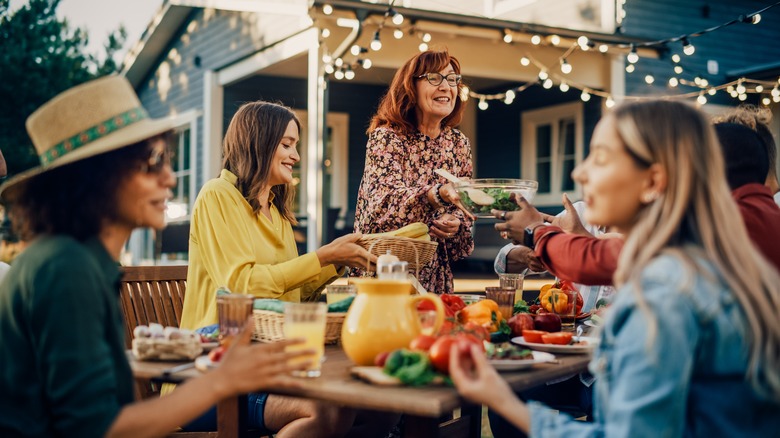 group of people eating outside
