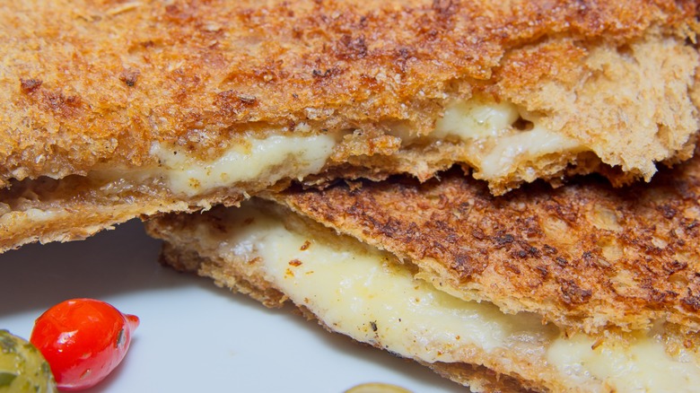 Close up of cheese-crusted grilled cheese sandwich