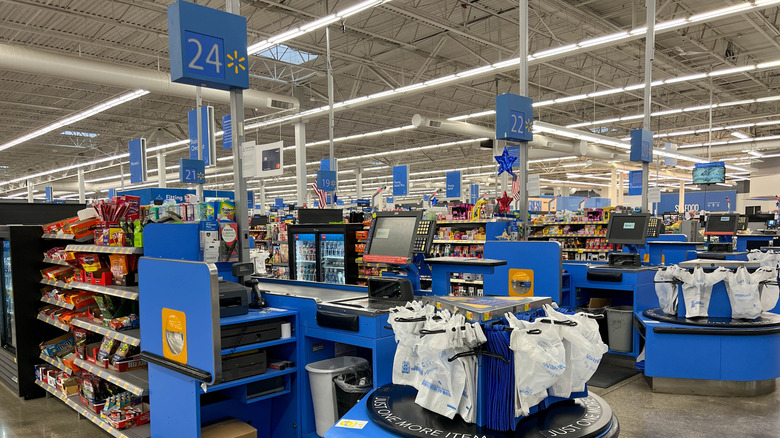 Several checkout lanes at a walmart store