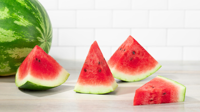Slices of fresh watermelon on countertop