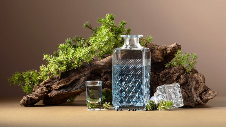 Decanter and glass of blue gin