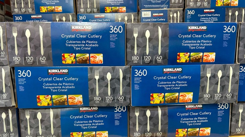 Several boxes of Kirkland Signature Cutlery stacked on top of each other