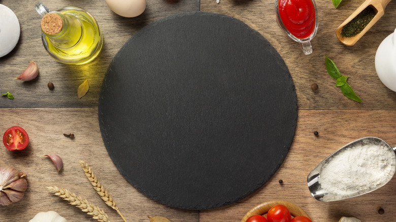 oil and ingredients near stone