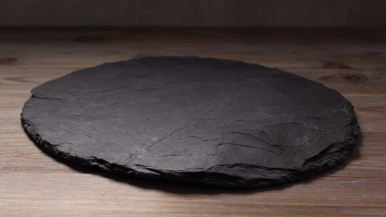 dark stone on wood