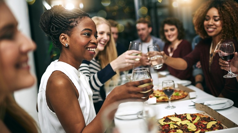 People enjoying wine