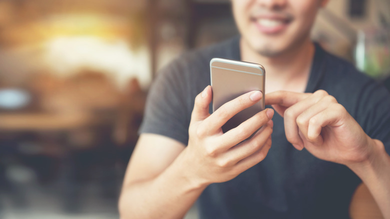 Man using smartphone