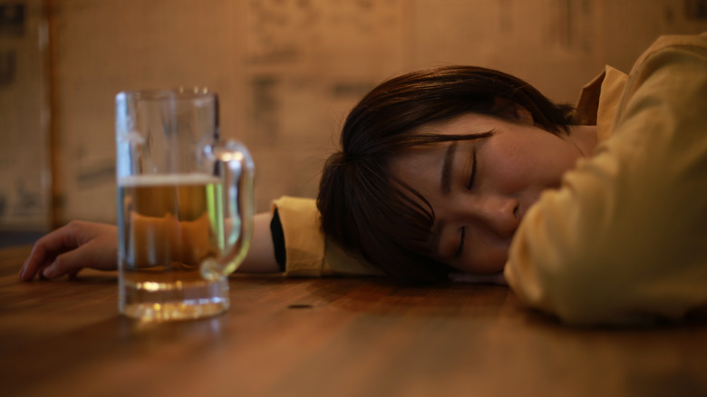 Person passed out at restaurant