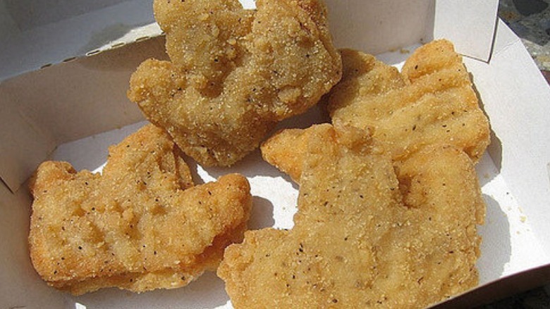 Bk crown-shaped nuggets in a container