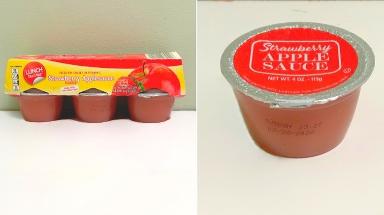 A pack of Lunch Buddies Strawberry Applesauce Cups next to an individual strawberry applesauce cup