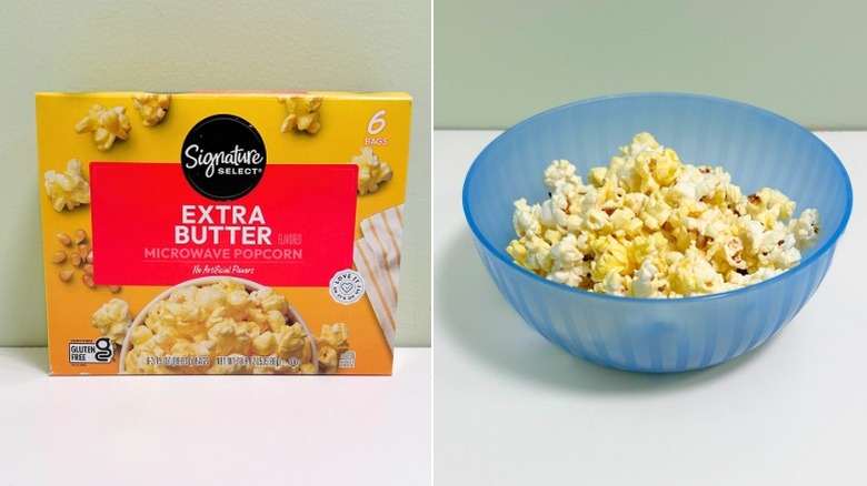 A box of Shoprite Extra Butter Microwave Popcorn next to a blue bowl of popcorn