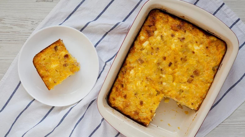 Breakfast Casserole With Sausage and serving on white plate