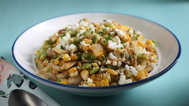 Warm Grilled Corn And Edamame Succotash Salad in a serving bowl