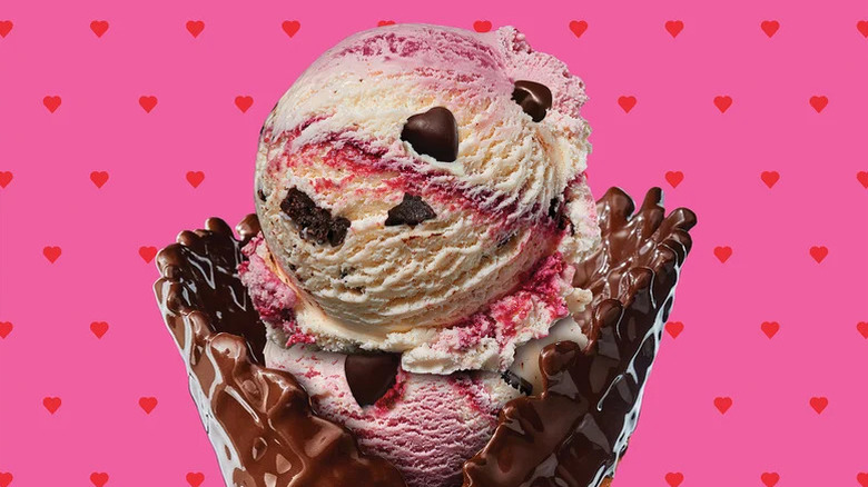A chocolate-covered ice cream cone filled with Baskin Robbins Love Potion 31 ice cream.