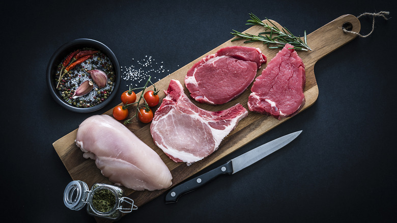 raw meat on cutting board