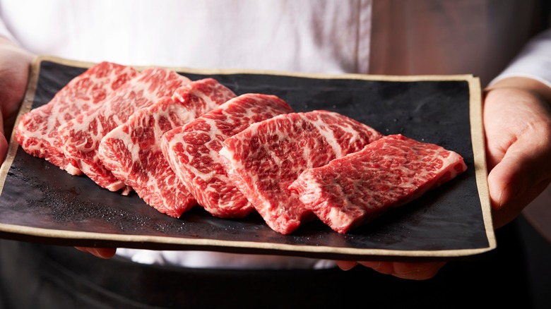 raw meat on platter