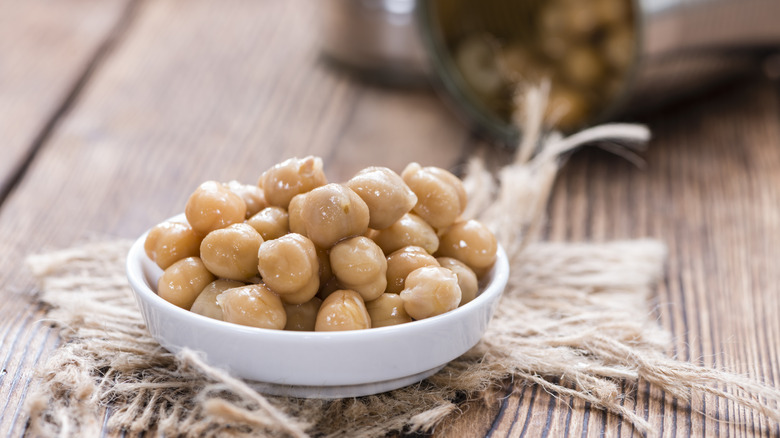 Canned chickpeas in a small white bowl