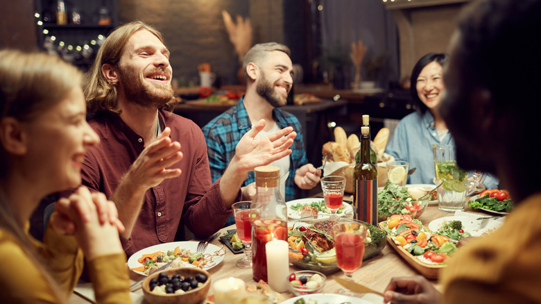 Group enjoying sit-down dinner