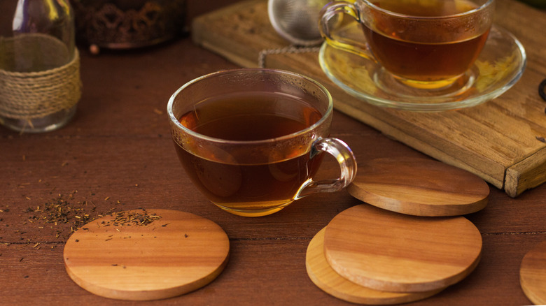 Table with coasters and glasses