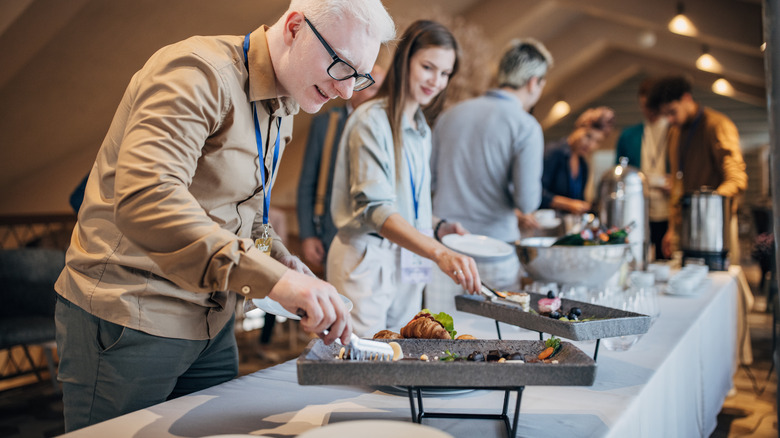 People enjoying a buffet