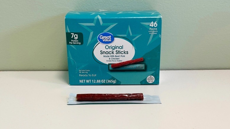 A box of Great Value Original Snack Sticks with a single snack stick in front
