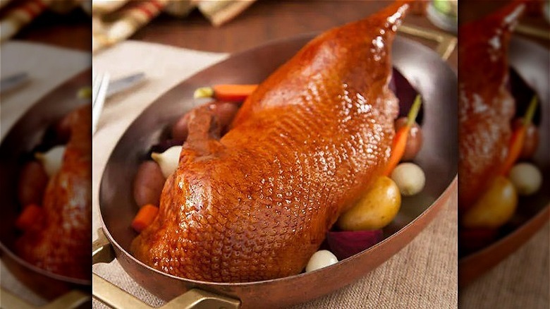 roasted half duck in pan
