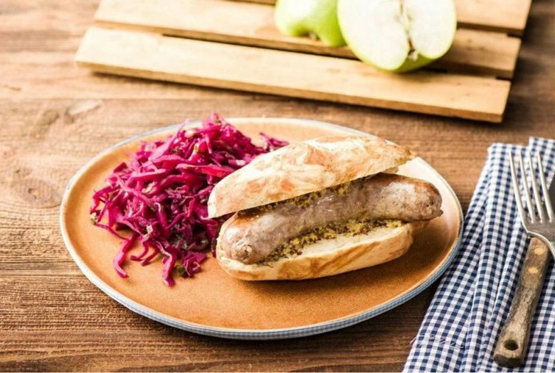 Pretzel Bun Bratwursts With Tangy Apple-Cabbage Slaw