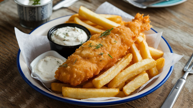 Plate of fish and chips with tartar sauce