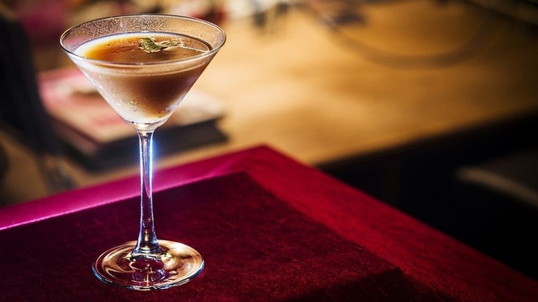 Chocolate cannoli cocktail in a glass on a bar